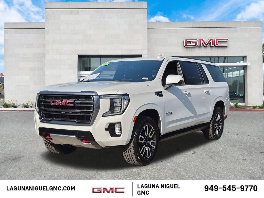 2022 GMC Yukon XL AT4 in White Frost Tricoat — front three-quarter view